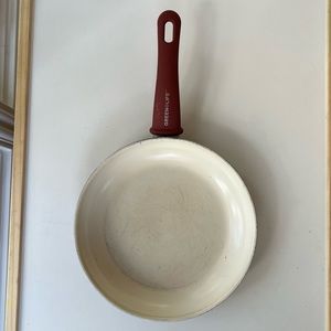 Large deep red frying pan with lid